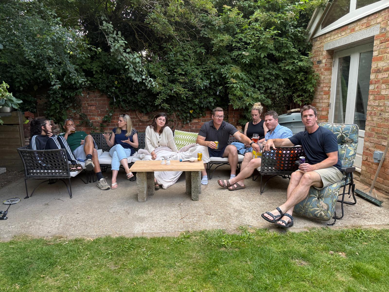 Adults relaxing at Jess' house